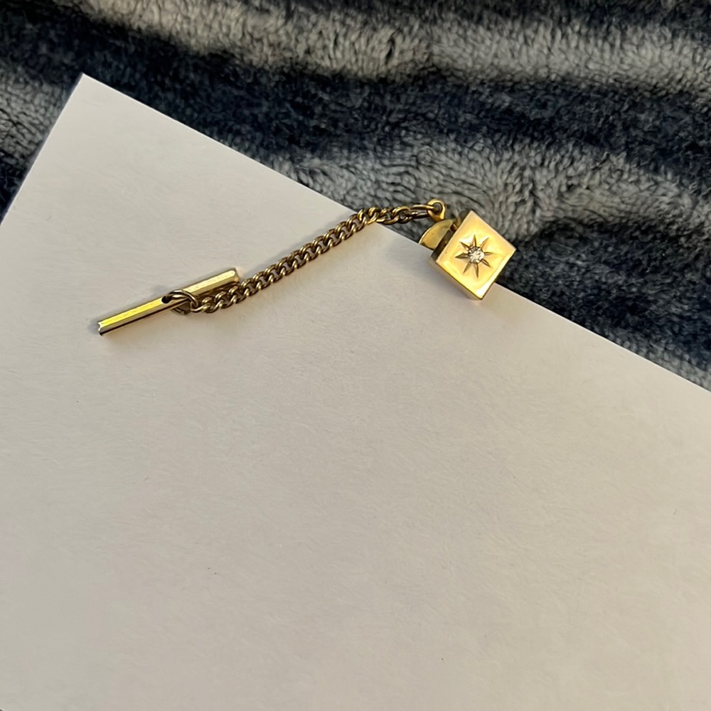 Gold Toned Starburst Tie Tack